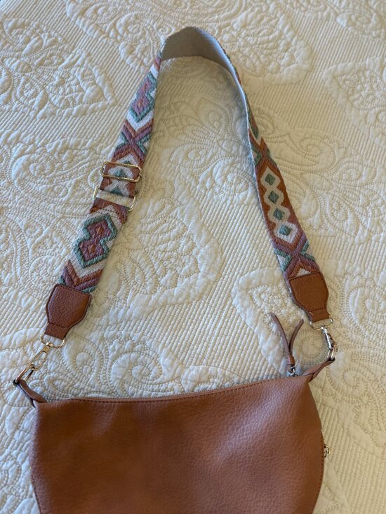 Handbags - Tan vegan leather crescent crossbody bag with a patterned boho guitar strap